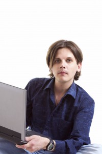 man works with a laptop